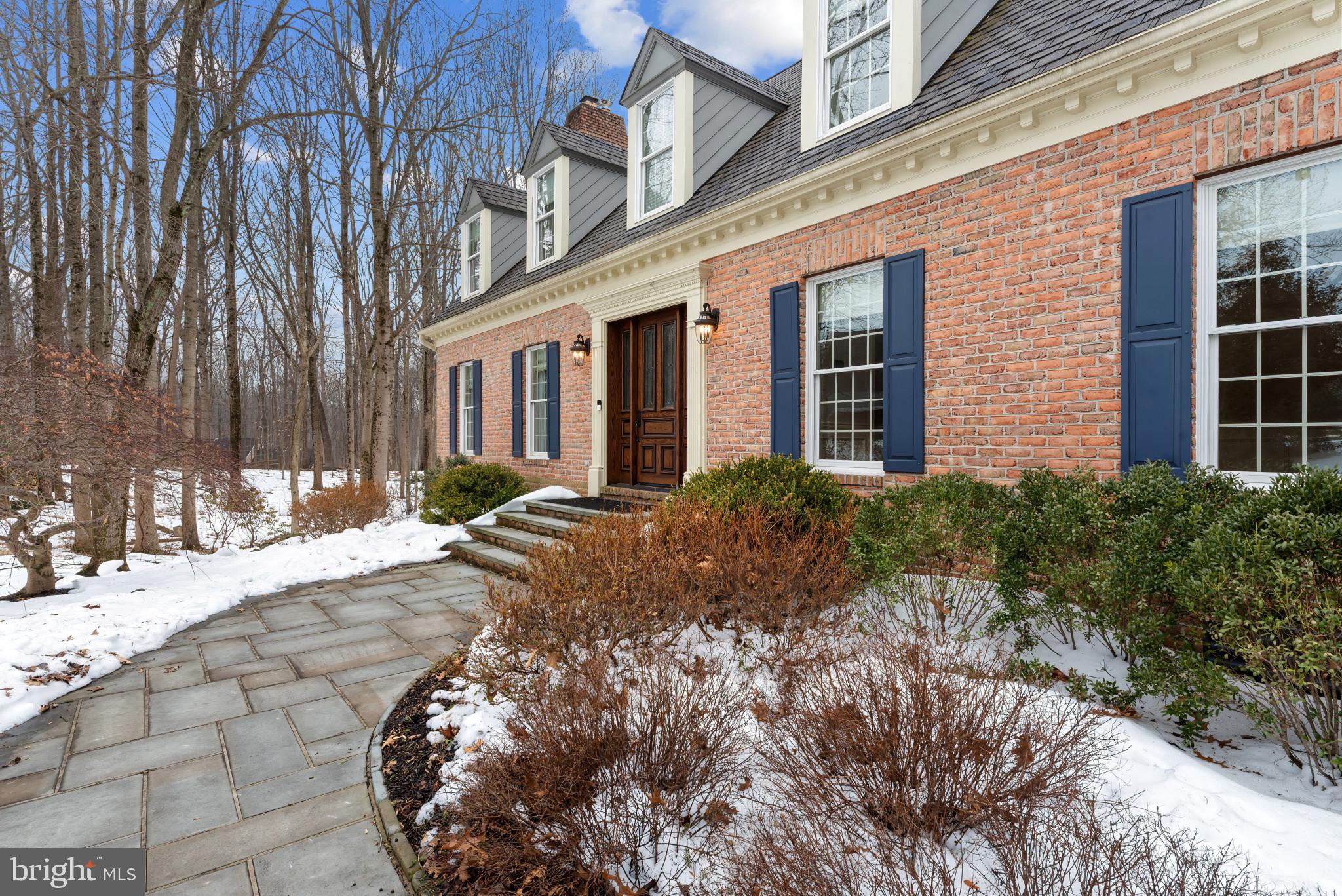 14002 Fox Run Court Phoenix, MD 21131 - Photo 2 of 64 a view of a house with a yard and pathway