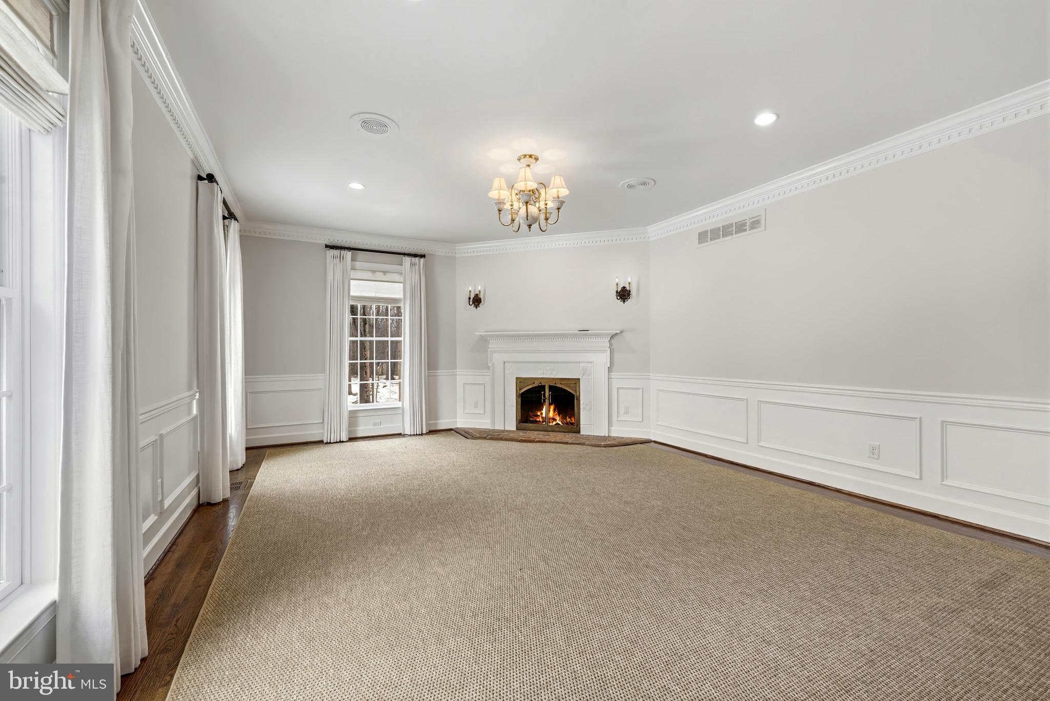14002 Fox Run Court Phoenix, MD 21131 - Photo 22 of 64 a view of a livingroom with an empty space and a fireplace