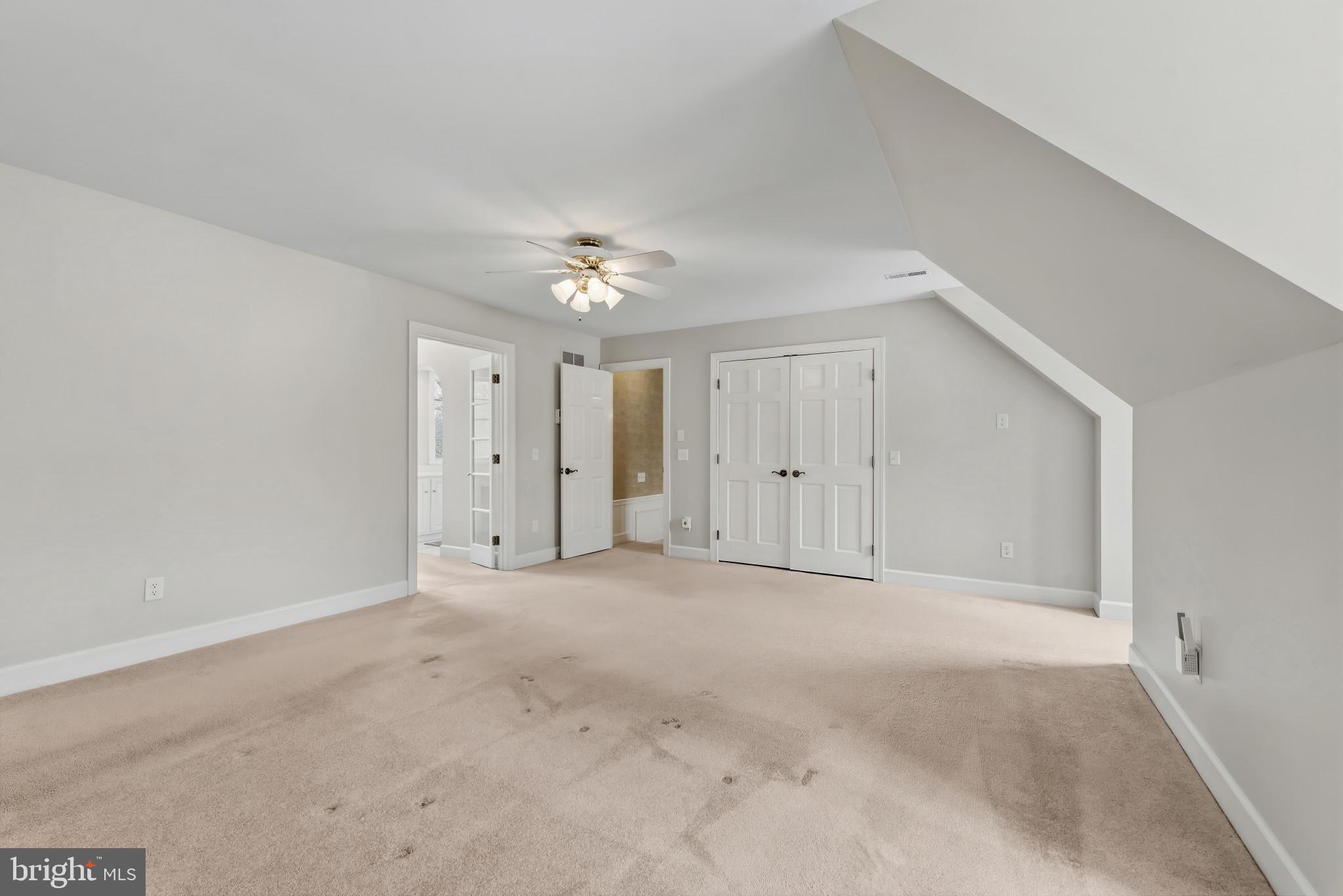 14002 Fox Run Court Phoenix, MD 21131 - Photo 29 of 64 a view of an empty room with a ceiling fan