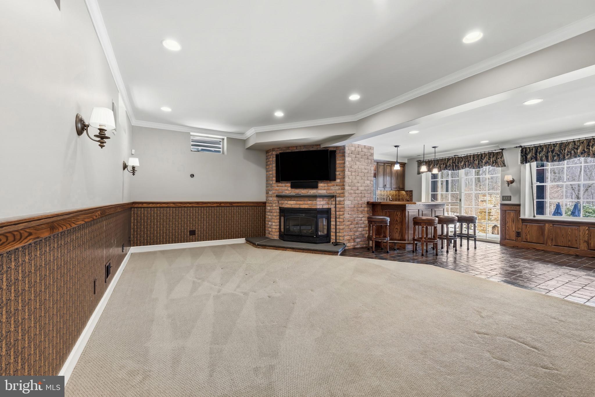 14002 Fox Run Court Phoenix, MD 21131 - Photo 46 of 64 a view of a livingroom with furniture and a fireplace