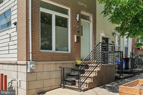 front view of a house with a street