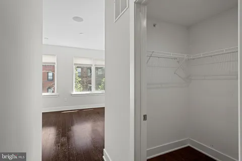 a view of small space with racks on the wall