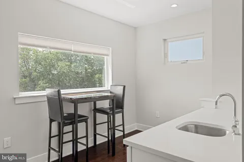 a table and chairs in a room
