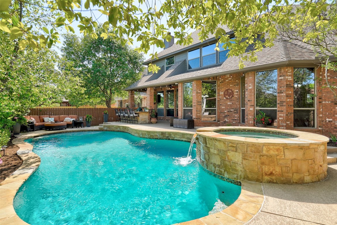 3308 Basalt Cove Round Rock, TX 78681 - Photo 1 of 1 a view of a house with a yard patio and swimming pool