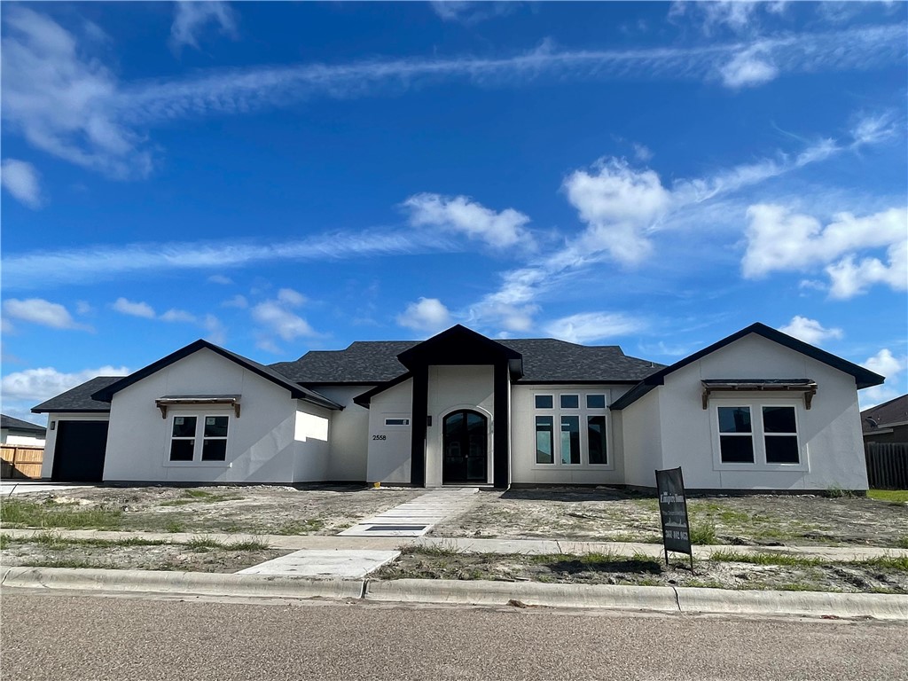 2558 Pacific View Street Corpus Christi, TX 78415 - Photo 2 of 12 a view of a house with a yard
