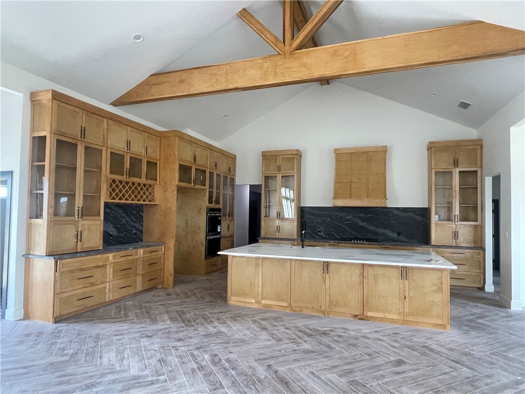 2558 Pacific View Street Corpus Christi, TX 78415 - Photo 5 of 12 a view of living room kitchen with stainless steel appliances wooden floor and chair