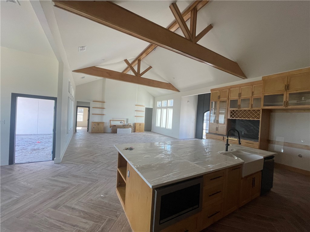 2558 Pacific View Street Corpus Christi, TX 78415 - Photo 6 of 12 a kitchen with a sink a counter space and appliances