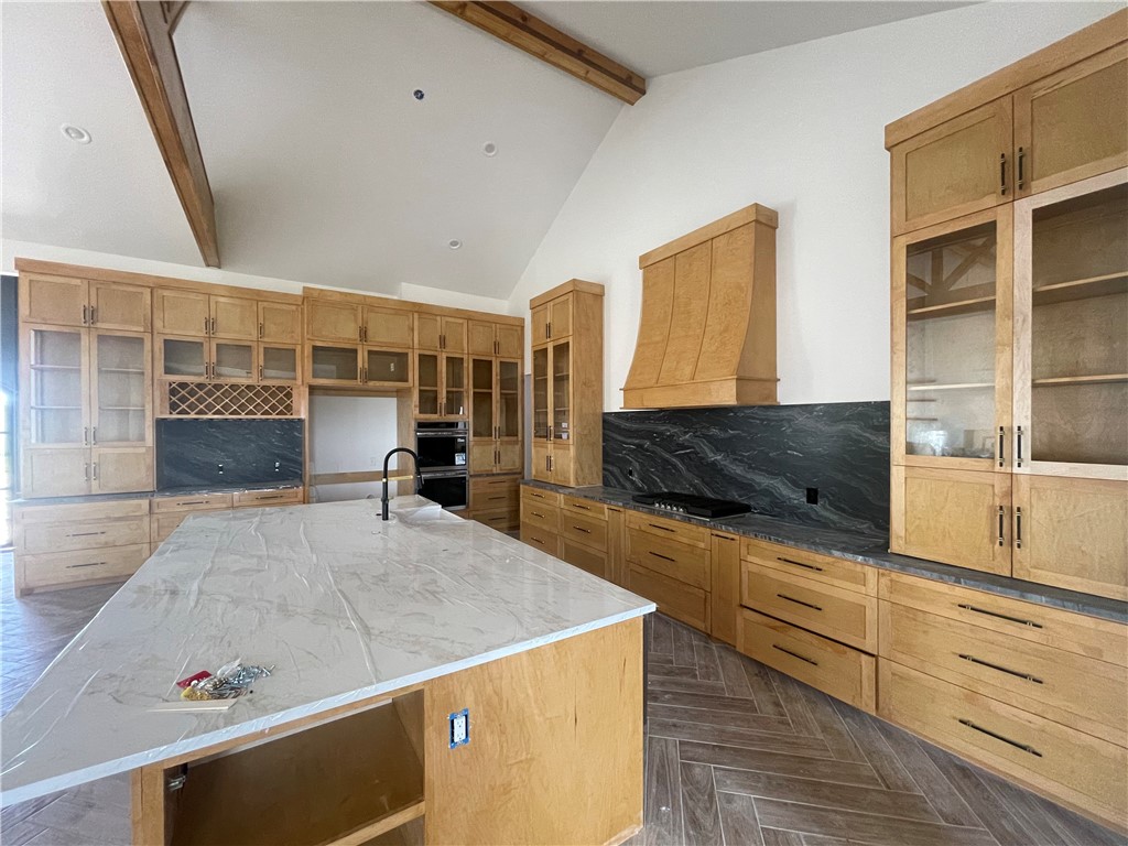 2558 Pacific View Street Corpus Christi, TX 78415 - Photo 7 of 12 a living room with stainless steel appliances kitchen island granite countertop a stove and a sink