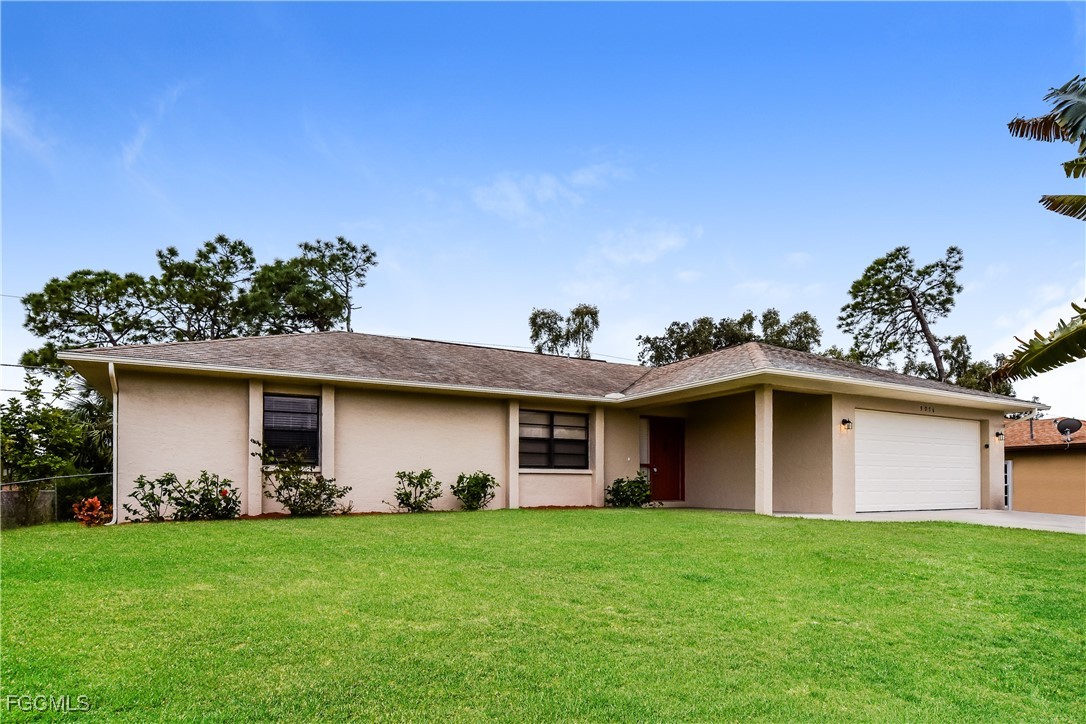 a house view with a garden space