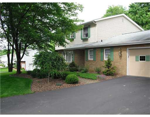 Exterior Front. Welcome!  This angle gives you a little closer look at the entrance way to the home.  Nice paved driveway too!