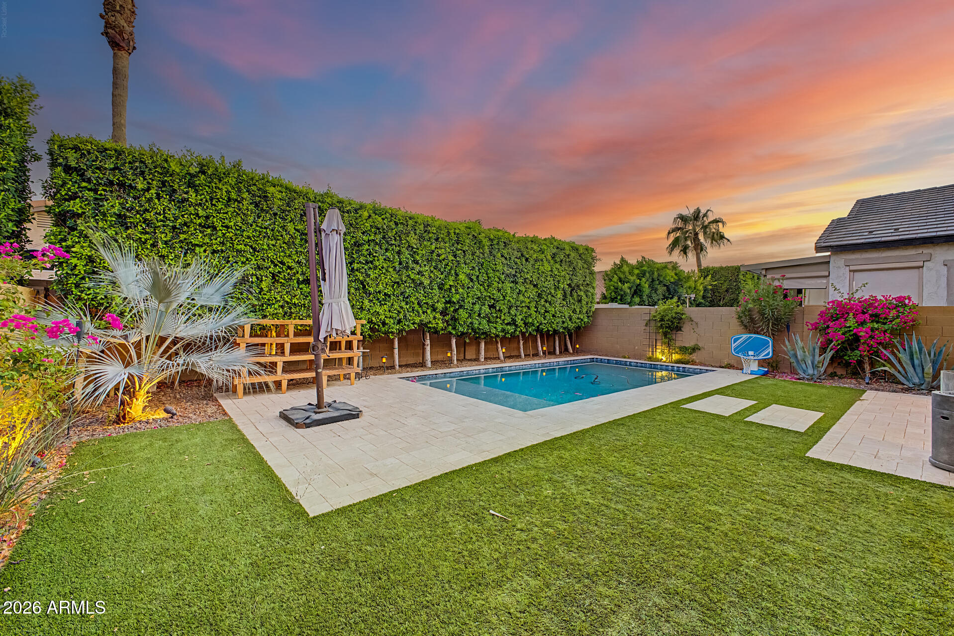 819 West Deer Creek Road Phoenix, AZ 85048 - Photo 68 of 76 a view of a backyard with plants and a patio