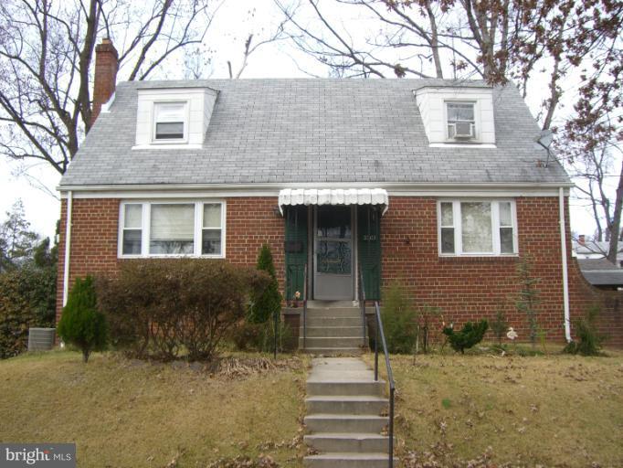 3303 Harrell Street Silver Spring, MD 20906 - Photo 1 of 1 a view of a house with street