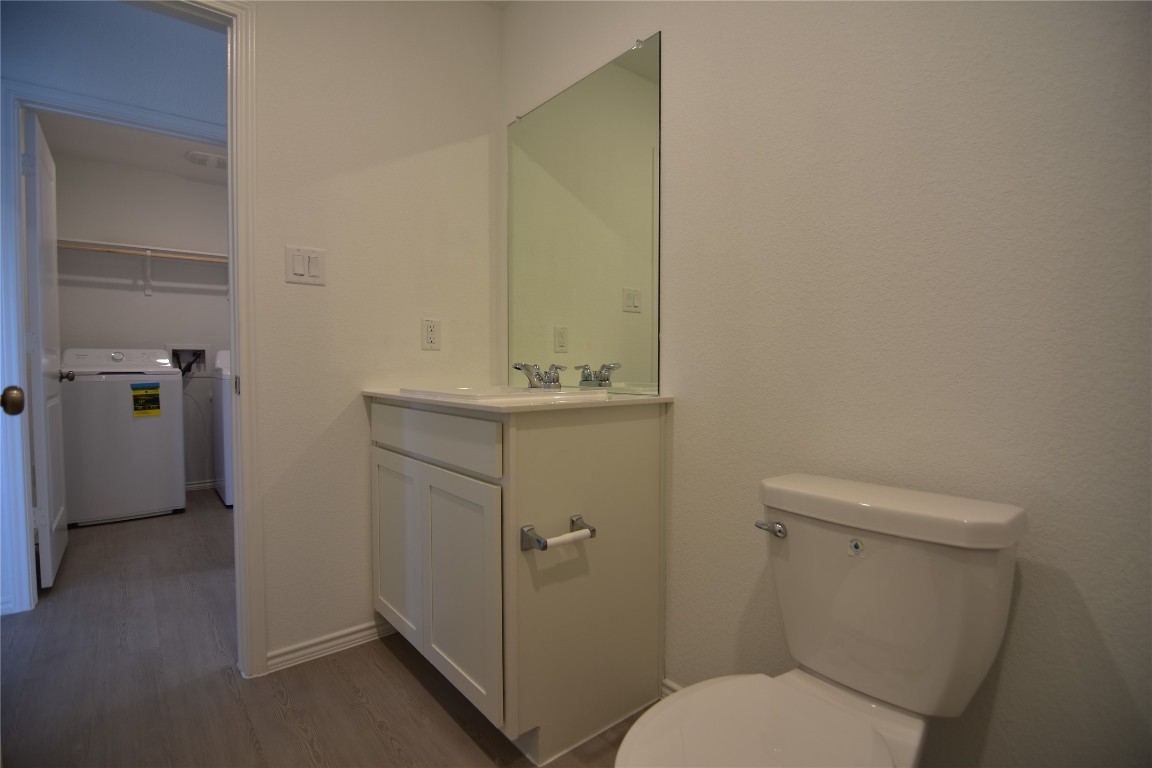 373 Keefer Kyle, TX 78640 - Photo 15 of 39 a bathroom with a sink a toilet and shower