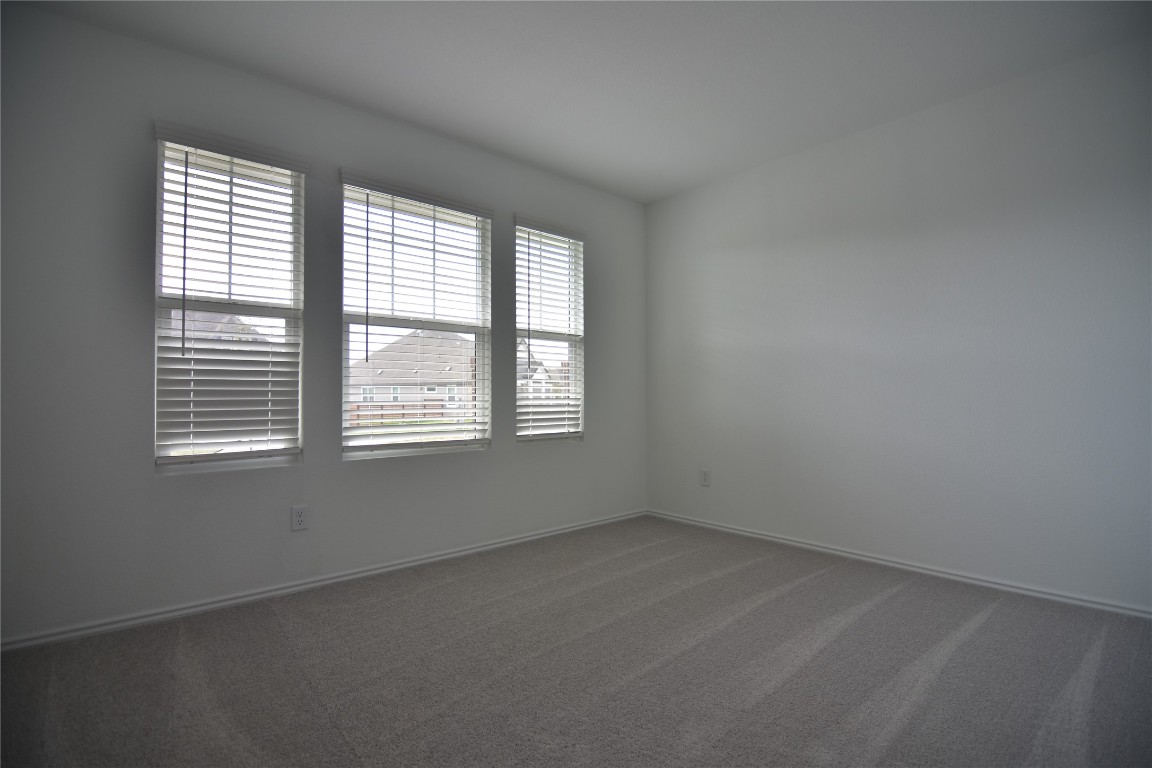 373 Keefer Kyle, TX 78640 - Photo 18 of 39 an empty room with a window