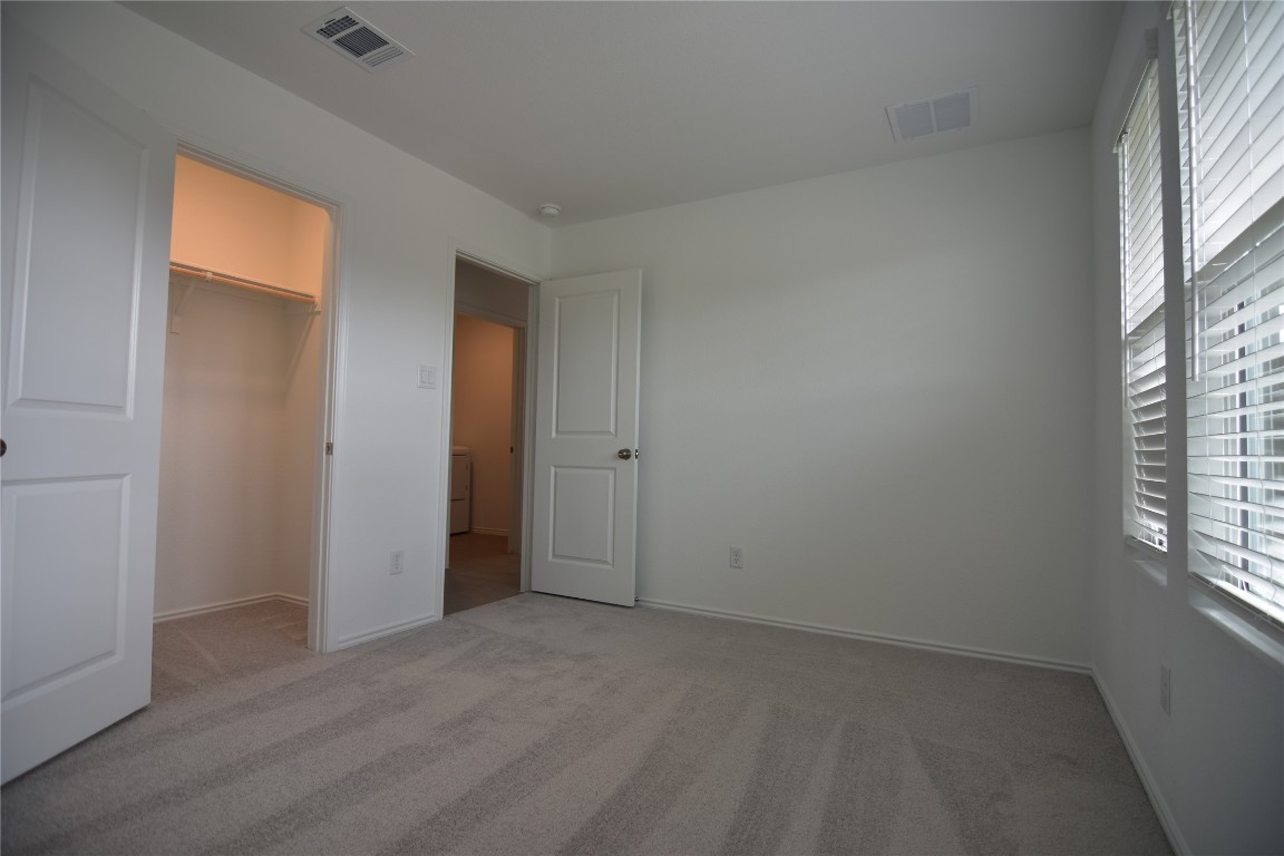 373 Keefer Kyle, TX 78640 - Photo 19 of 39 an empty room with windows