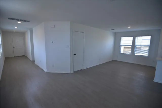 an empty room with windows