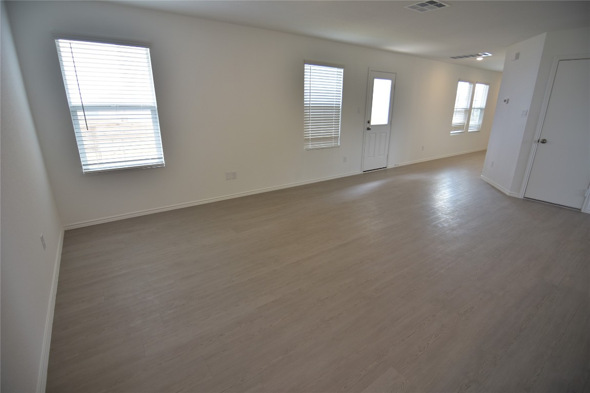 373 Keefer Kyle, TX 78640 - Photo 22 of 39 an empty room with windows