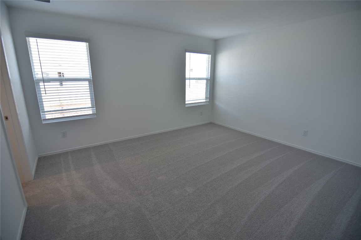 373 Keefer Kyle, TX 78640 - Photo 23 of 39 an empty room with a window