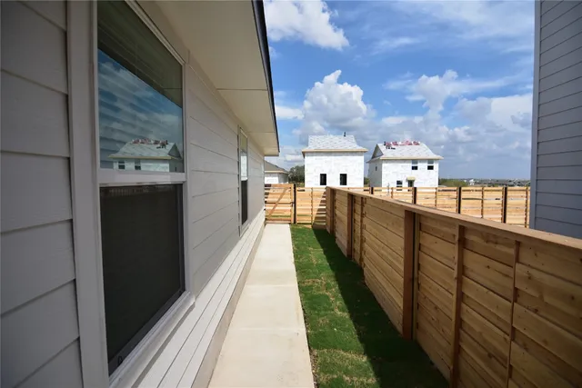 a kitchen with a refrigerator stove and microwave