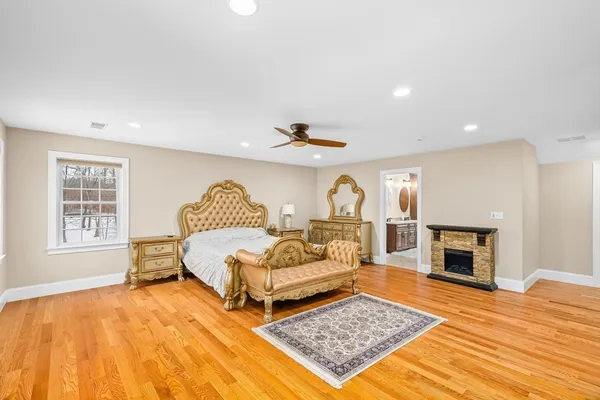 a bedroom with a bed and a couch