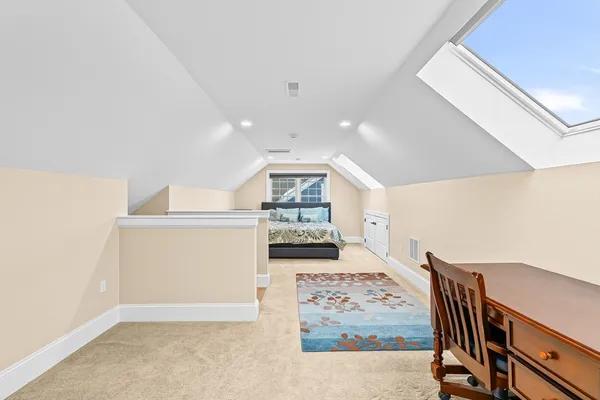 a view of a hallway with workspace