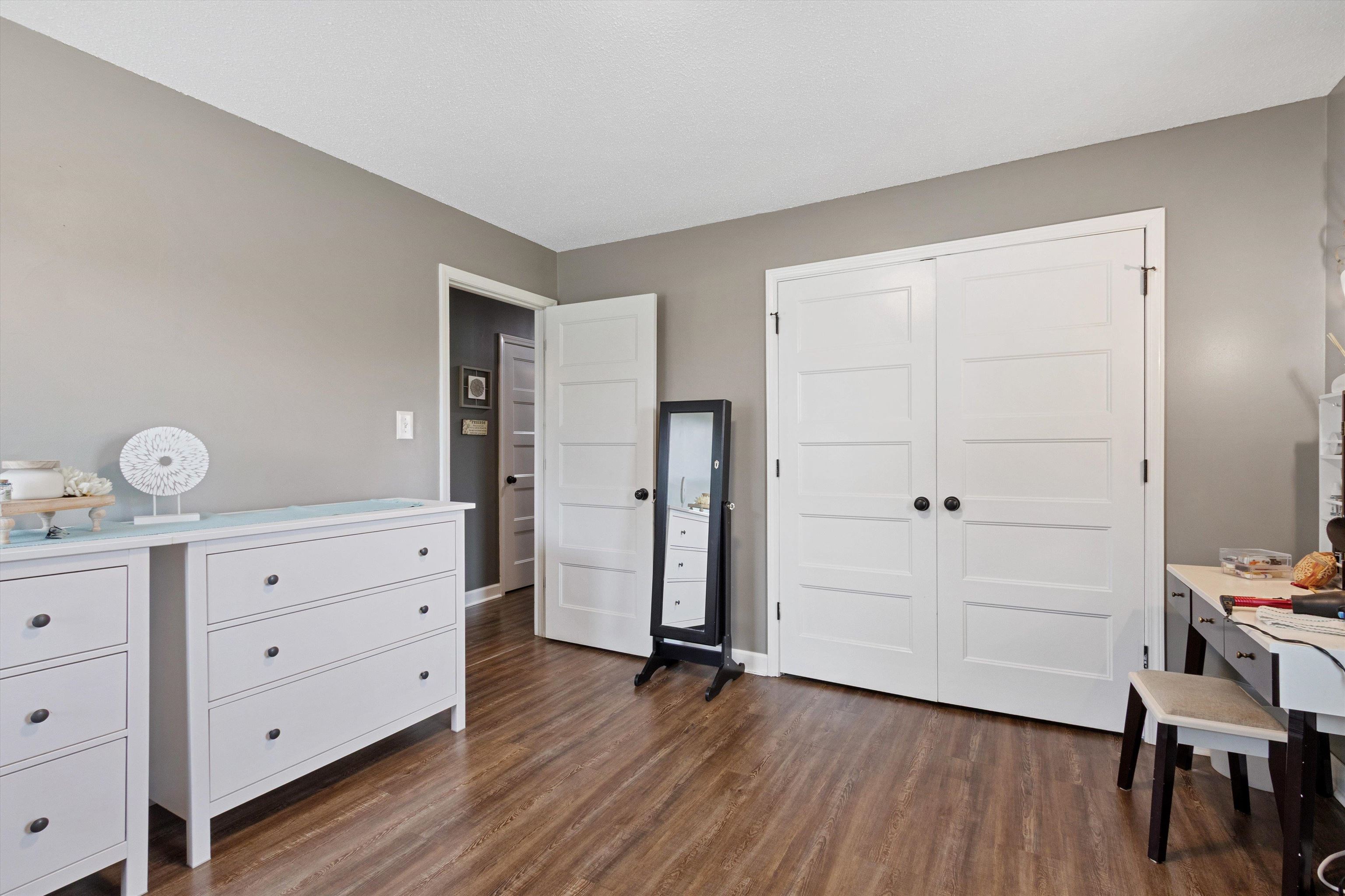 4500 Drummonds Road Drummonds, TN 38023 - Photo 15 of 29 a view of a dresser with wooden floor
