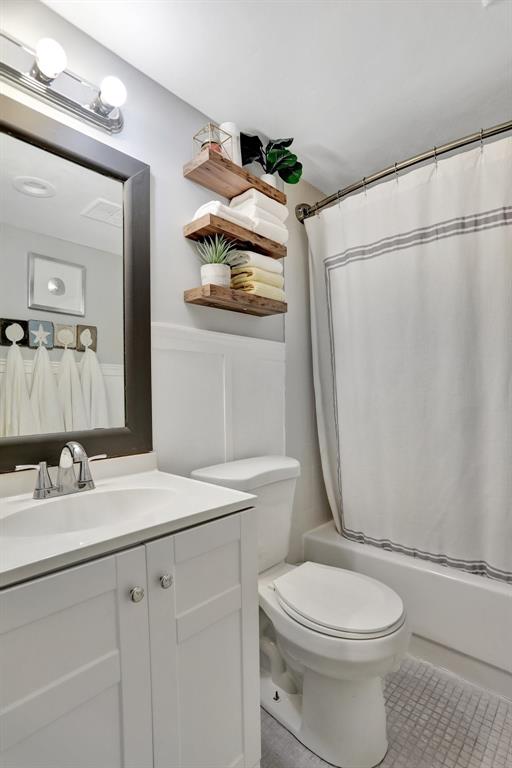 4160 Inverrary Drive, Unit 402 Lauderhill, FL 33319 - Photo 18 of 24 a bathroom with a sink a toilet and shower