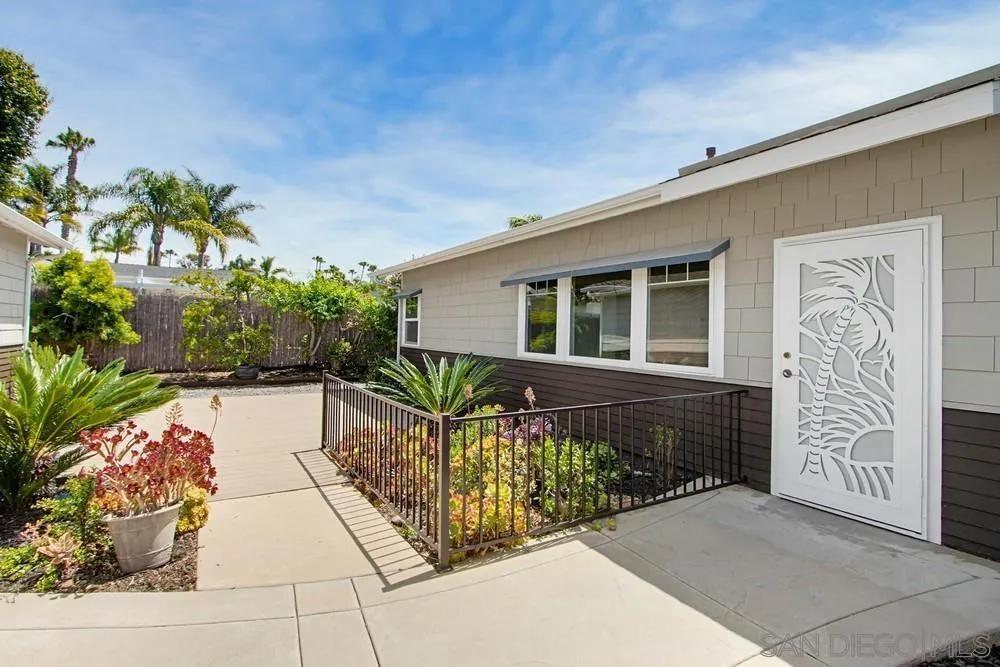 1027 Knowles Avenue Carlsbad, CA 92008 - Photo 25 of 42 a front view of a house with outdoor seating