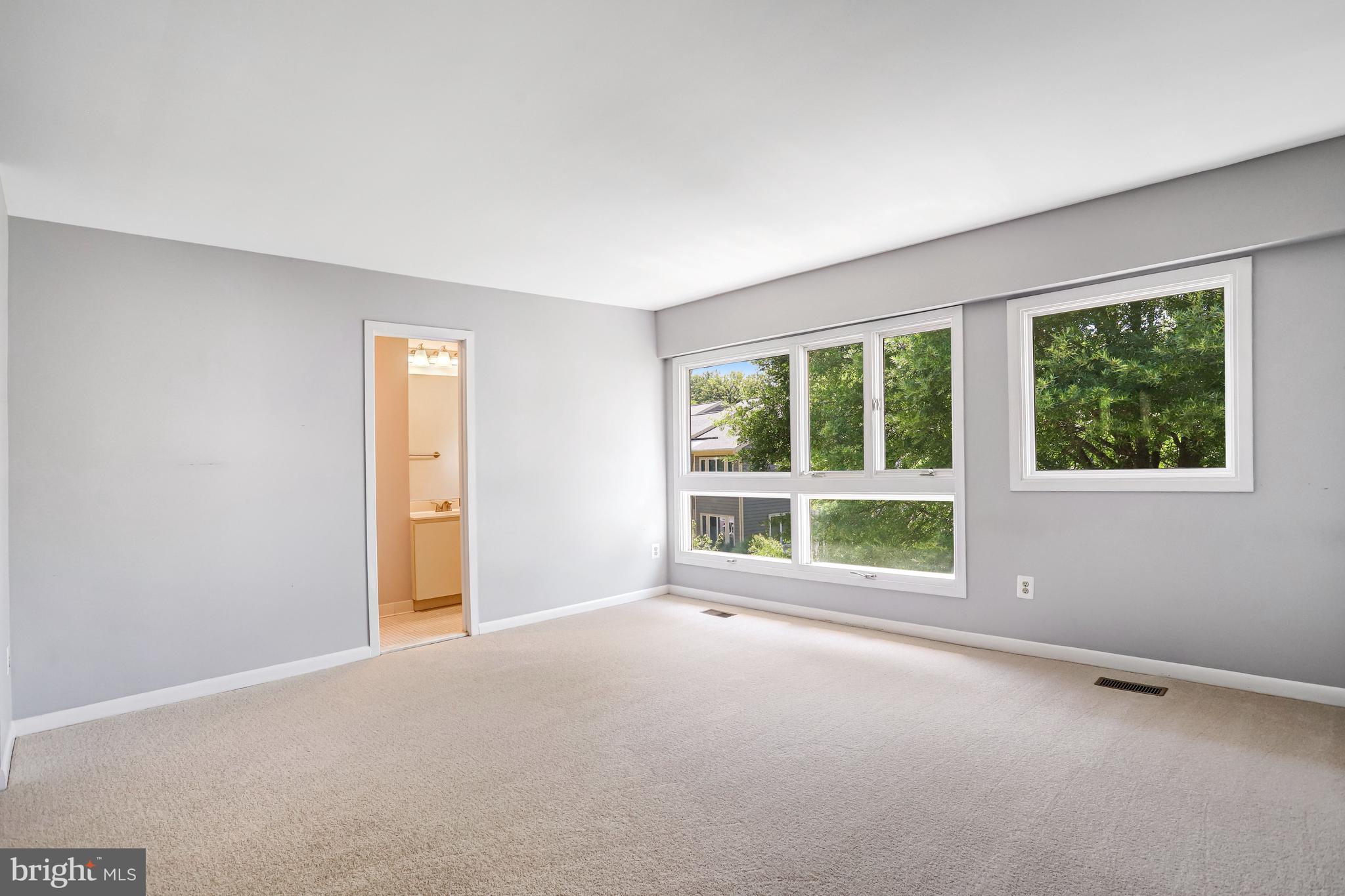 1953 Lakeport Way Reston, VA 20191 - Photo 11 of 60 a view of an empty room with a window
