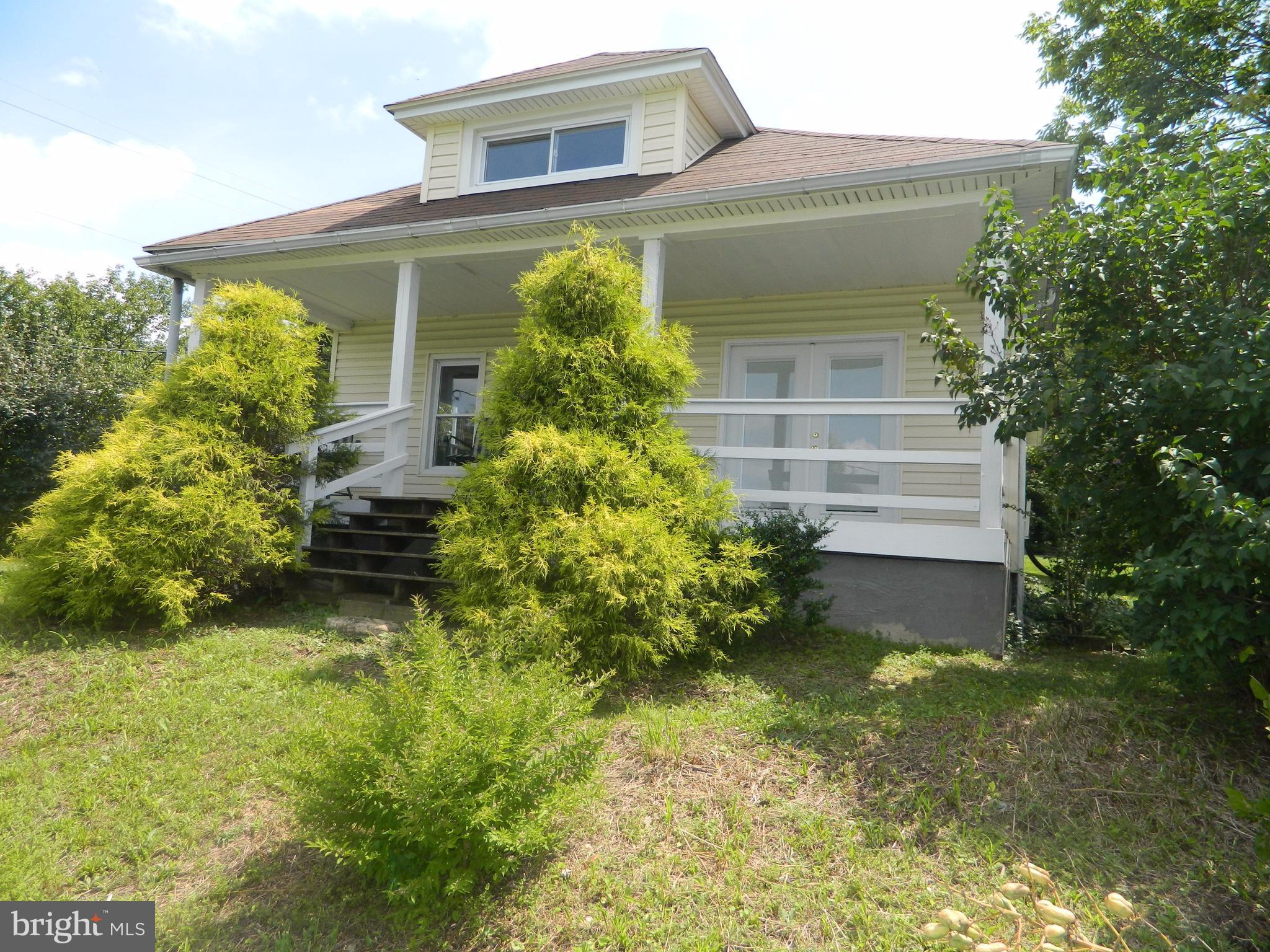 1601 Freeland Road Freeland, MD 21053 - Photo 1 of 29 a front view of a house with garden