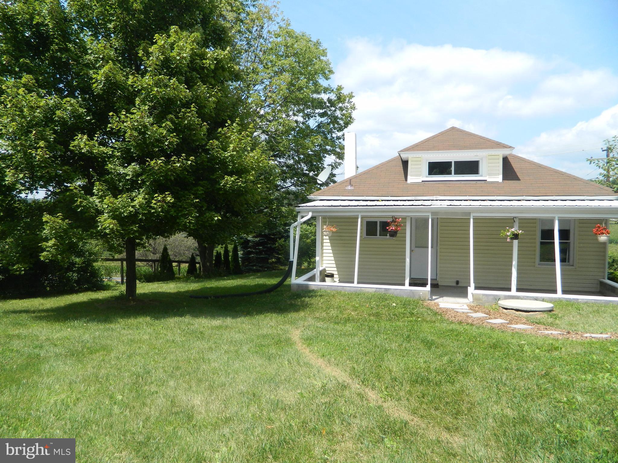 1601 Freeland Road Freeland, MD 21053 - Photo 24 of 29 a front view of a house with a garden and trees
