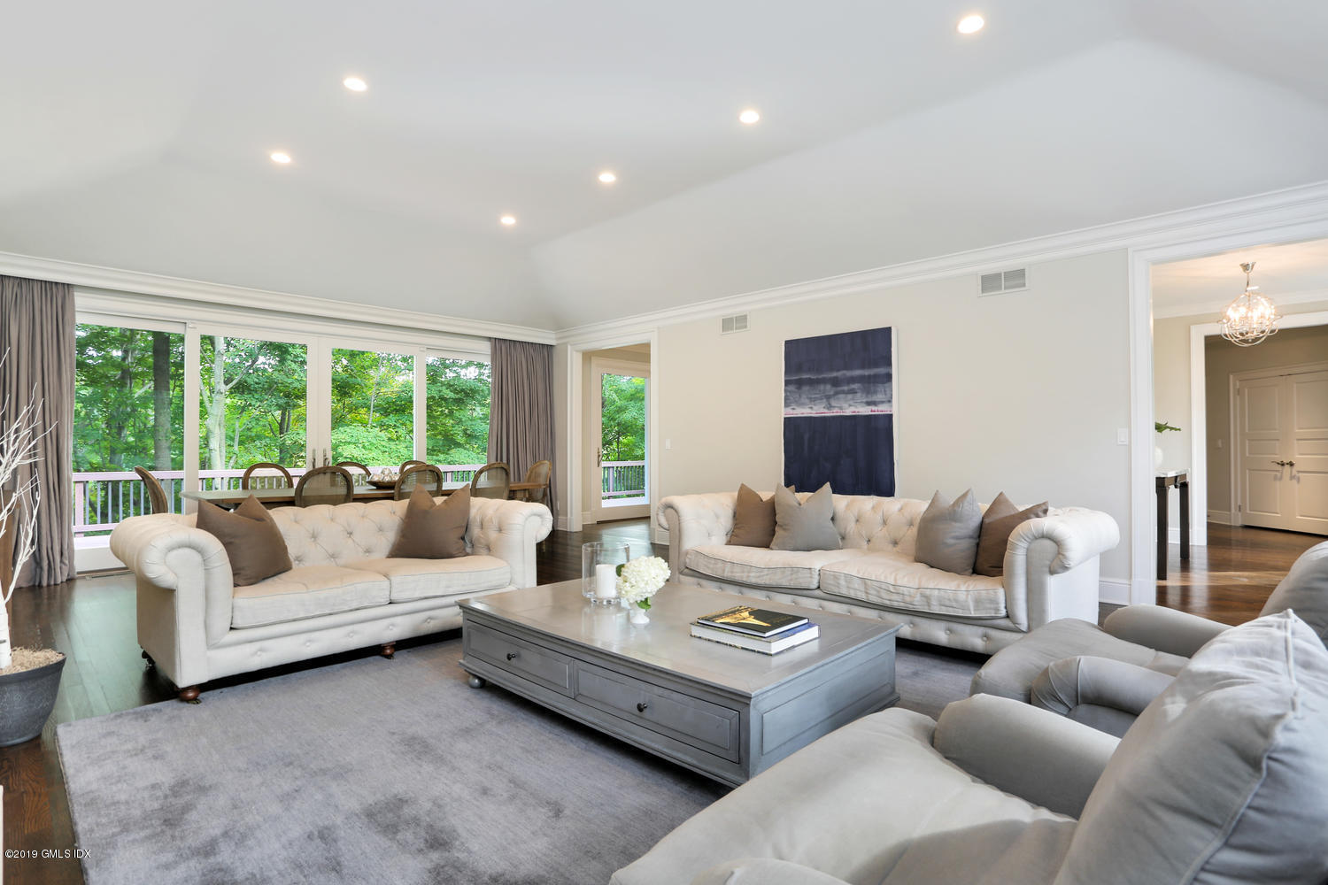 1 Lia Fail Way Cos Cob, CT 06807 - Photo 3 of 26 a living room with furniture and a large window