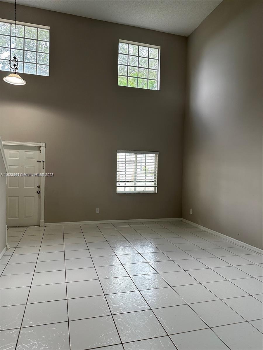 Avalon Miramar, FL 33025 - Photo 2 of 14 an empty room with windows