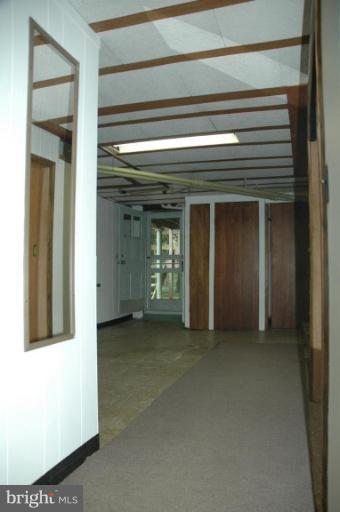 624 North Bend Road Baltimore, MD 21229 - Photo 15 of 22 a view of an empty room with closet and a window