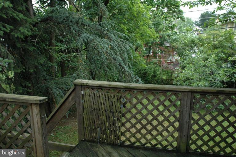624 North Bend Road Baltimore, MD 21229 - Photo 18 of 22 a view of balcony with wooden floor and fence