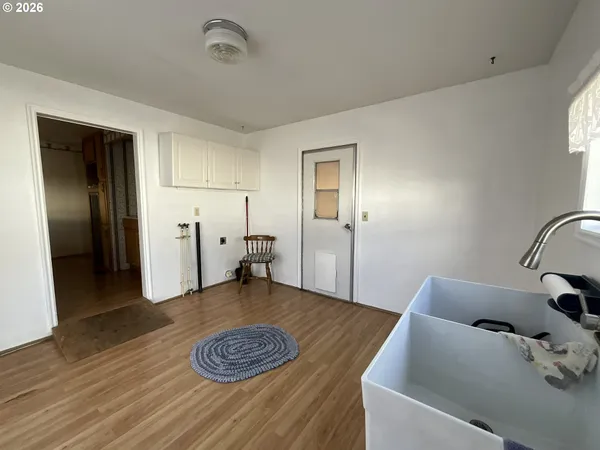 a view of livingroom with furniture and wooden floor