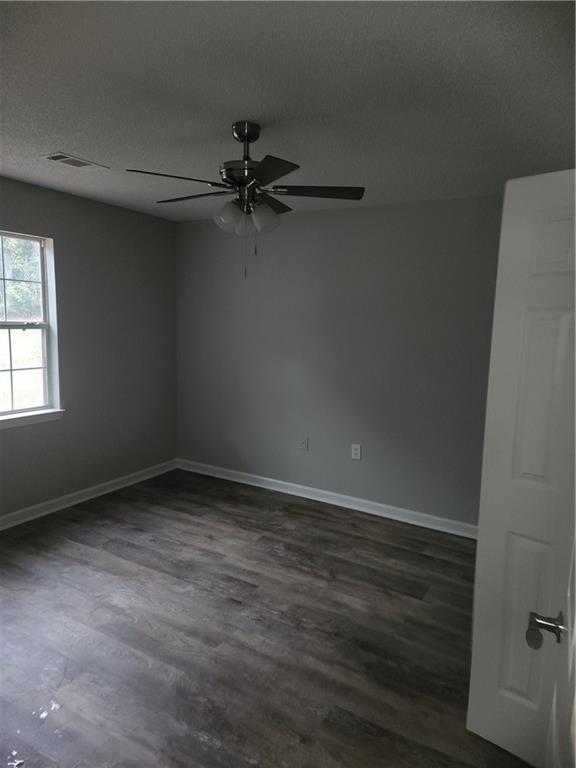6130 Geiger Street Northwest Covington, GA 30014 - Photo 13 of 23 wooden floor in an empty room