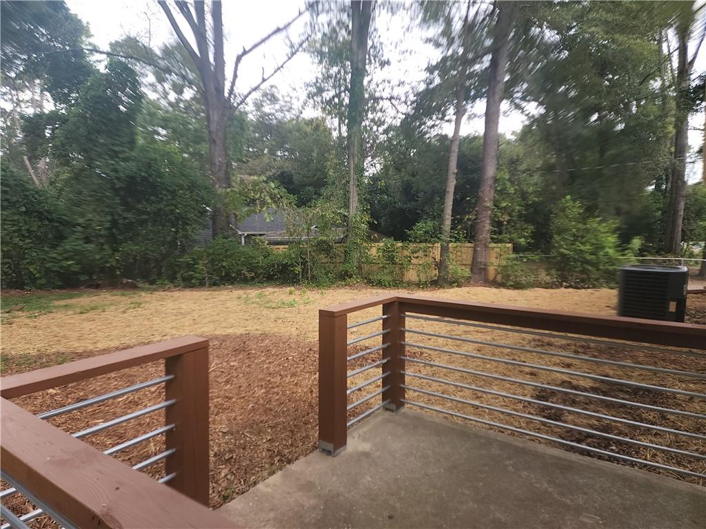 6130 Geiger Street Northwest Covington, GA 30014 - Photo 16 of 23 a view of a yard