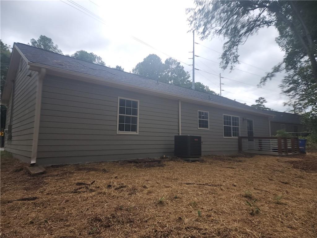 6130 Geiger Street Northwest Covington, GA 30014 - Photo 4 of 23 a view of a backyard
