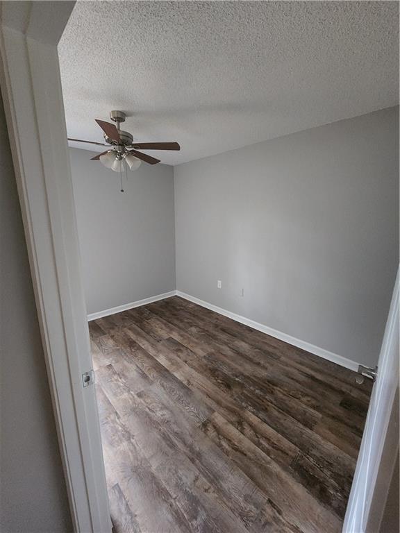 6130 Geiger Street Northwest Covington, GA 30014 - Photo 9 of 23 a view of a room with wooden floor