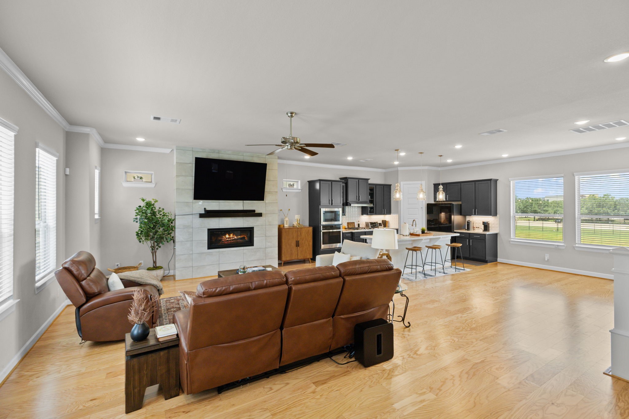 4004 Centre Meadow Way Houston, TX 77043 - Photo 11 of 33 Beautiful fireplace and nice floors