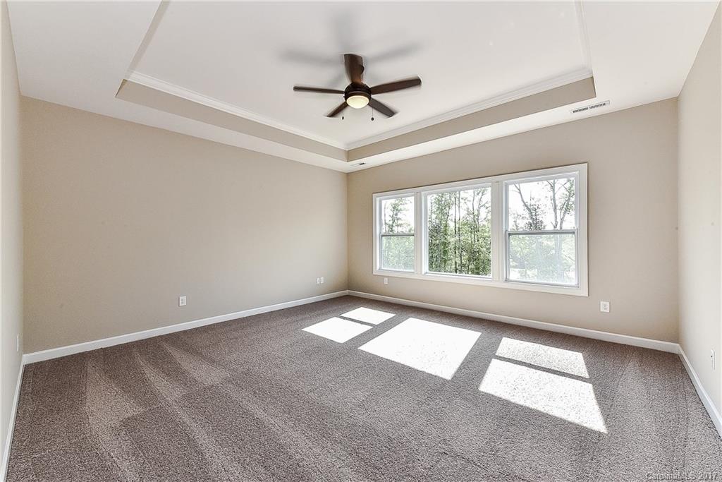 286 Hampton Trail Drive, Unit HAE0111 Fort Mill, SC 29708 - Photo 14 of 24 a view of an empty room with a window