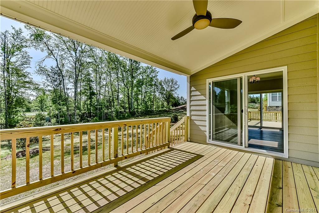 286 Hampton Trail Drive, Unit HAE0111 Fort Mill, SC 29708 - Photo 22 of 24 a view of a balcony with wooden floor