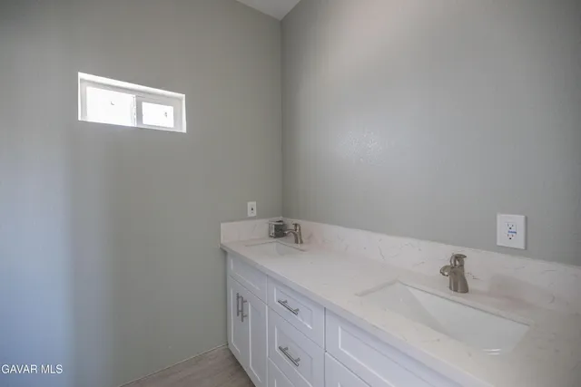 a view of a backyard of the house