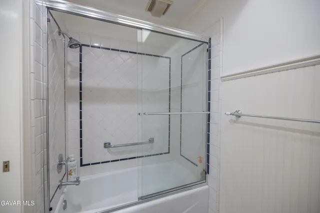 an empty room with a empty space and windows