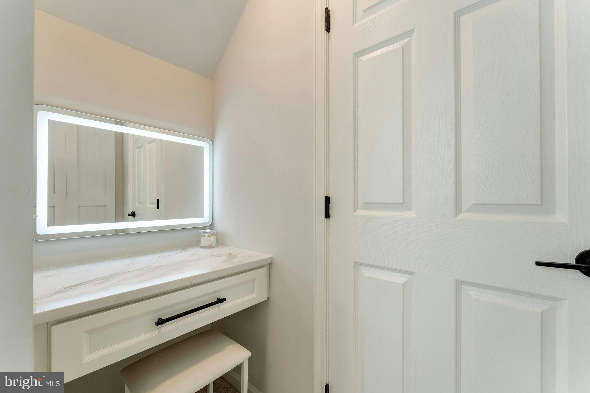17045 Hamilton Station Road Hamilton, VA 20158 - Photo 39 of 81 Quartz countertops with backlit mirror