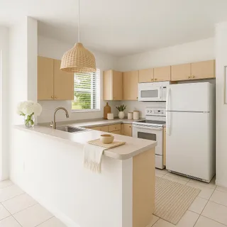 a kitchen with appliances a sink and a window