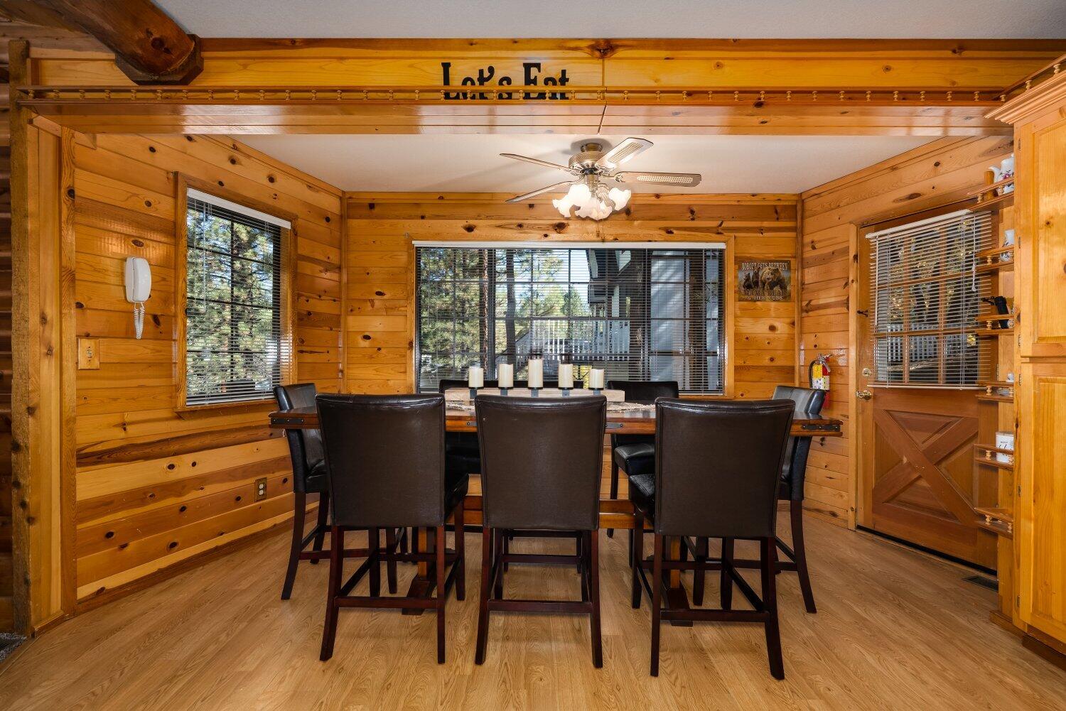 42363 Paramount Road Big Bear Lake, CA 92315 - Photo 16 of 38 a view of a dining room with furniture window and wooden floor
