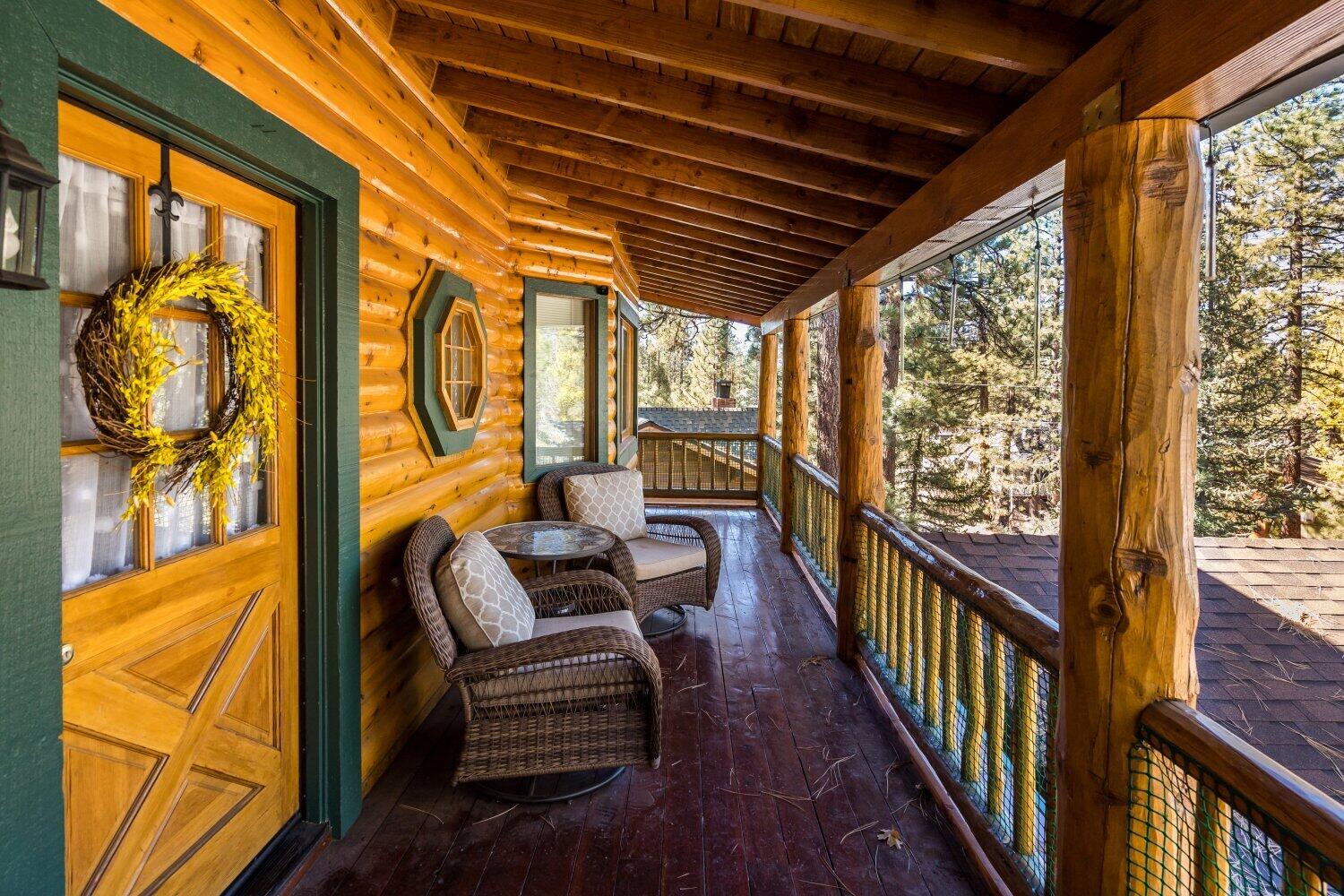 42363 Paramount Road Big Bear Lake, CA 92315 - Photo 3 of 38 a view of a porch with furniture