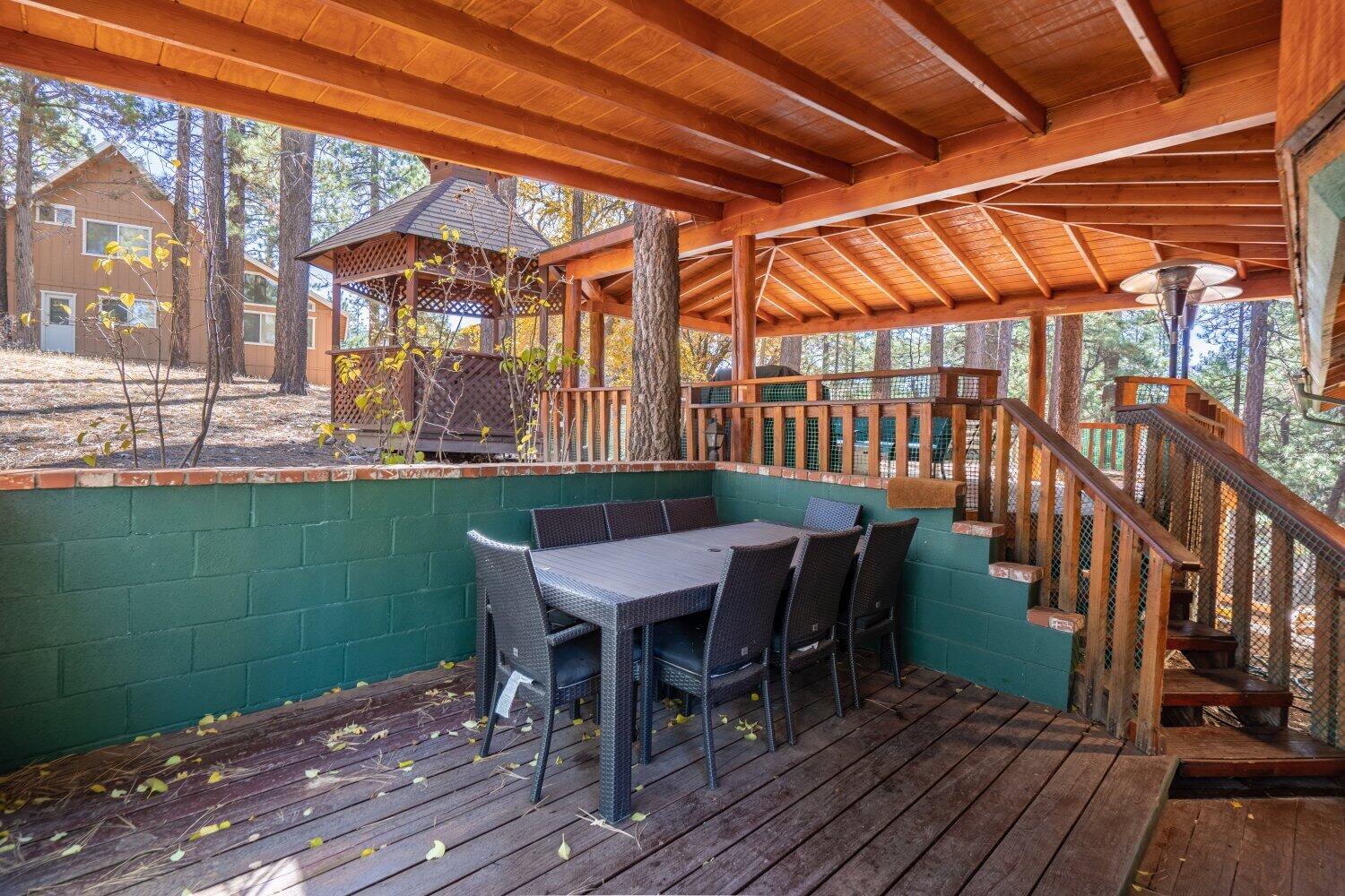 42363 Paramount Road Big Bear Lake, CA 92315 - Photo 38 of 38 a view of a chairs and table on the deck